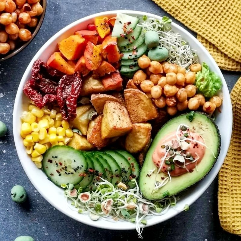 Grain bowl with roasted vegetables and avocado