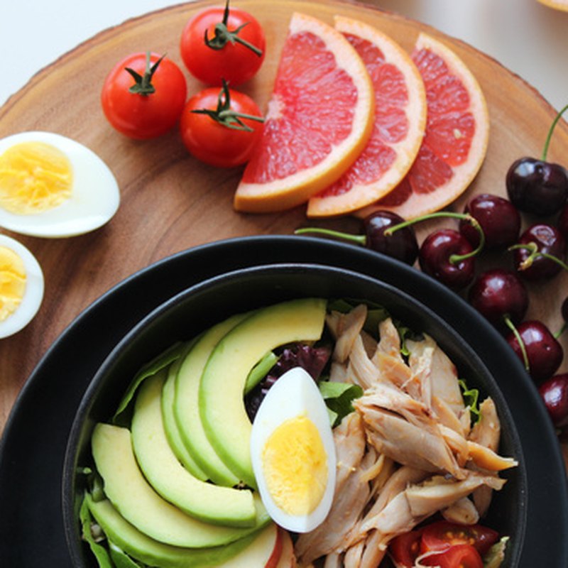Salad bowl with egg, avocado and grapefruit