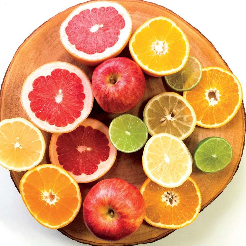 Platter of citrus fruit and apples