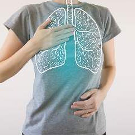 Illustration of the lungs over a hand on the chest
