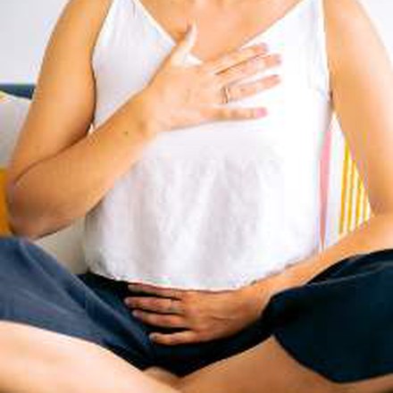 Hands resting on the chest and abdomen